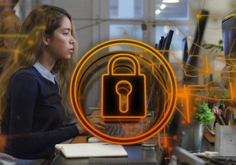 Firewalls and Encryption Image of security padlock icon against biracial woman using computer at office. Cyber security Firewalls and Encryption