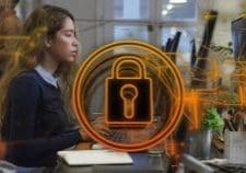 Firewalls and Encryption Image of security padlock icon against biracial woman using computer at office. Cyber security Firewalls and Encryption