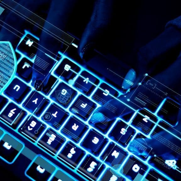 Closeup of hands using a keyboard Closeup of hands using a keyboard