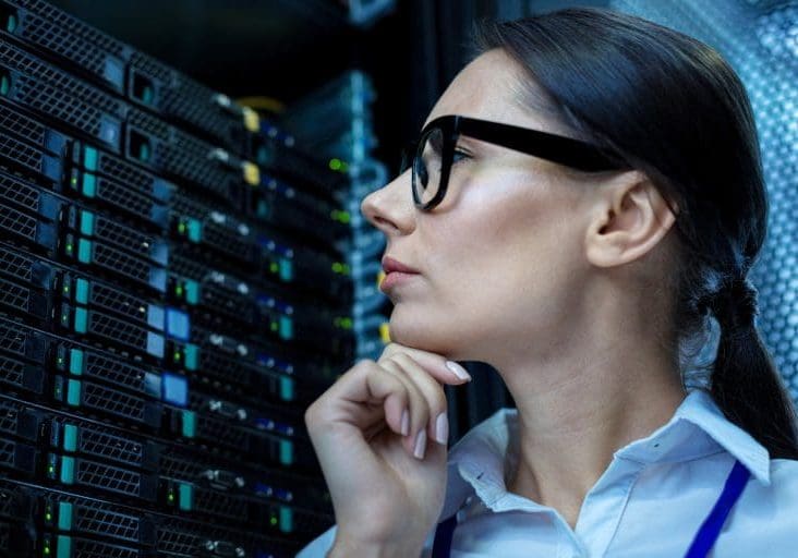 My attention. Concentrated thoughtful woman thinking and looking at the equipment