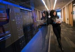 engineer holding laptop